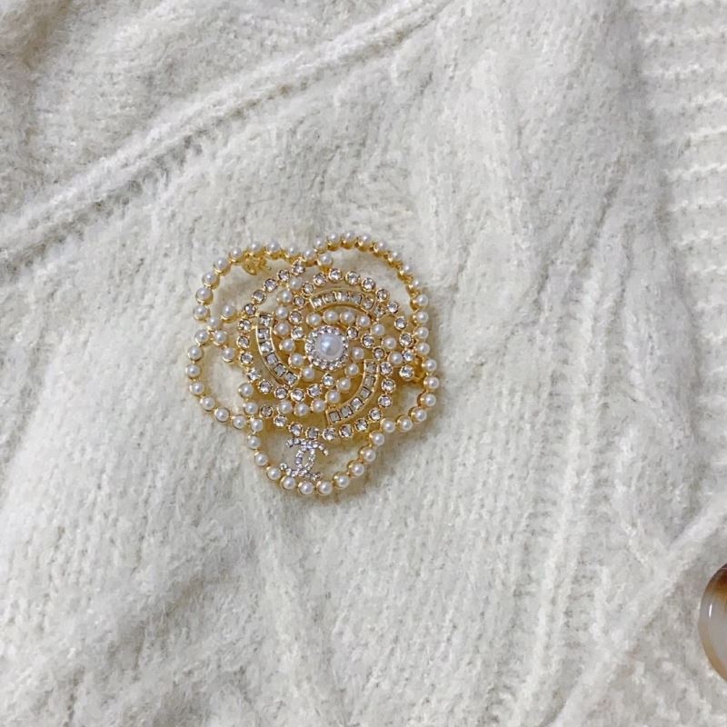 Ch*el brooches